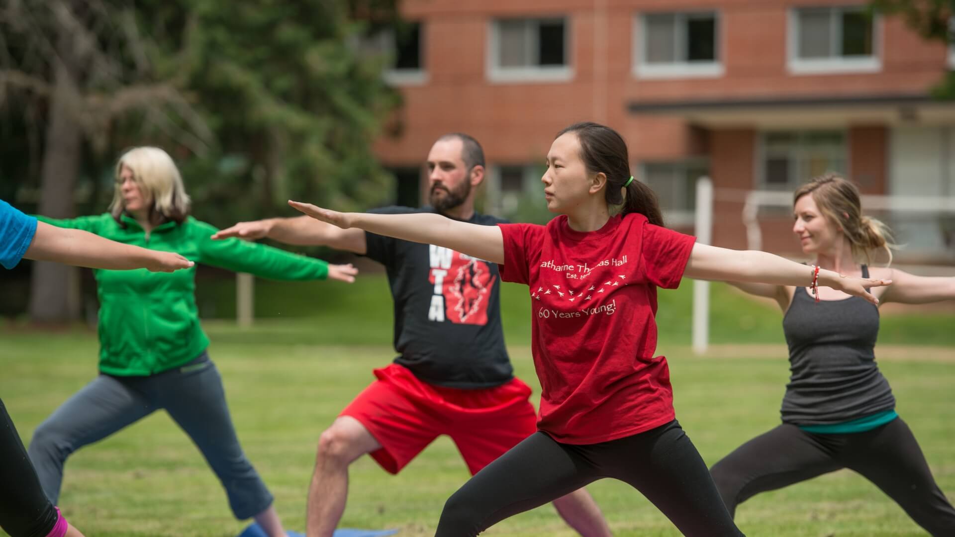 Group outdoor yoga class.