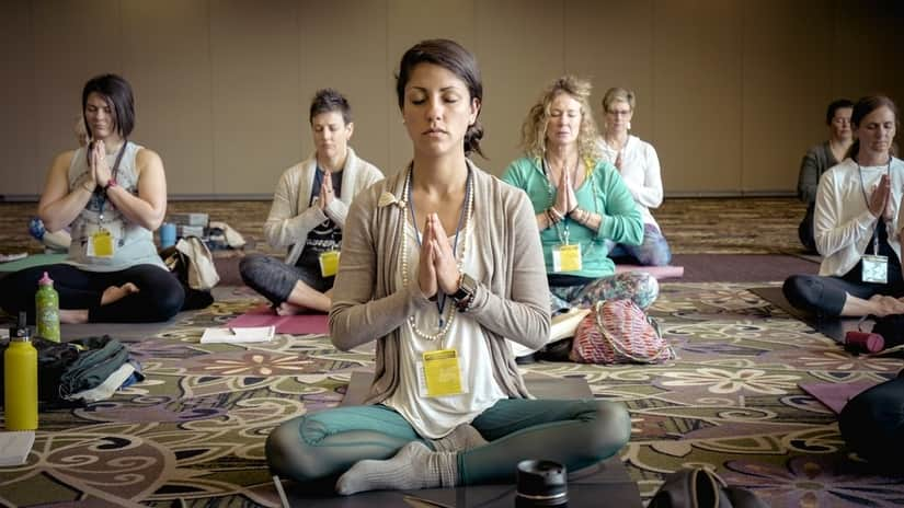 Group of people doing yoga