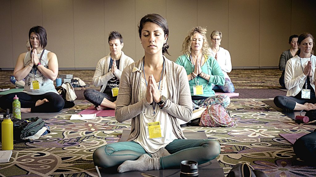 employee wellbeing  and workplace wellness with mindfulness and yoga classes