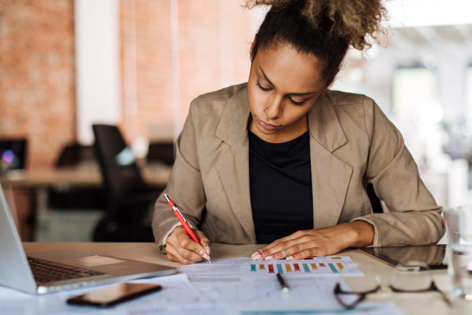 a highly productive and focused employee working at her desk
