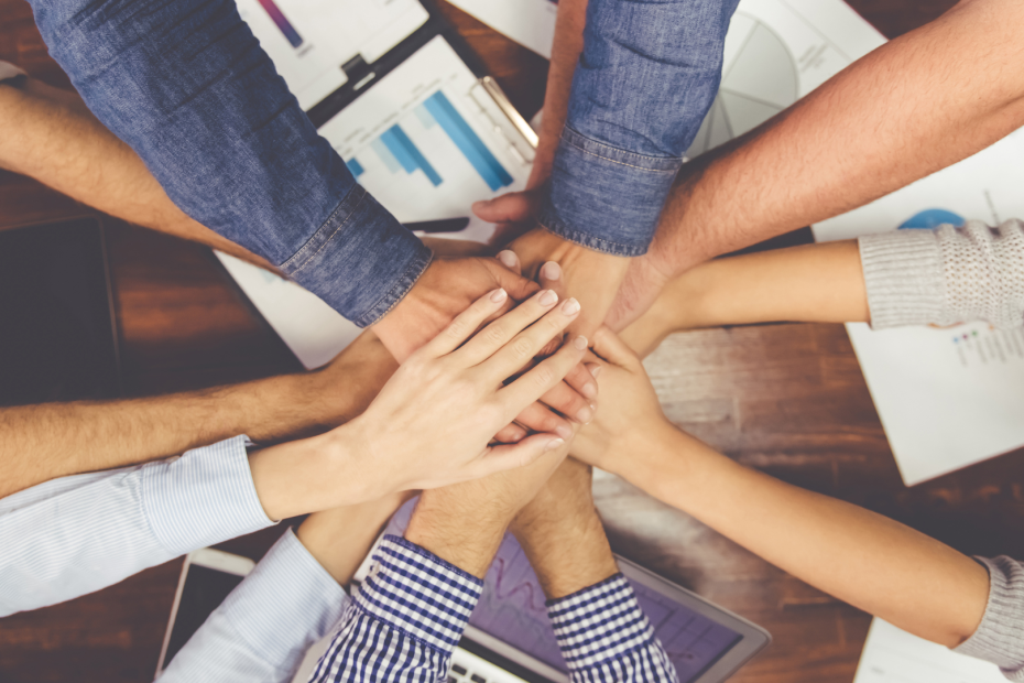 a group of employees celebrating success