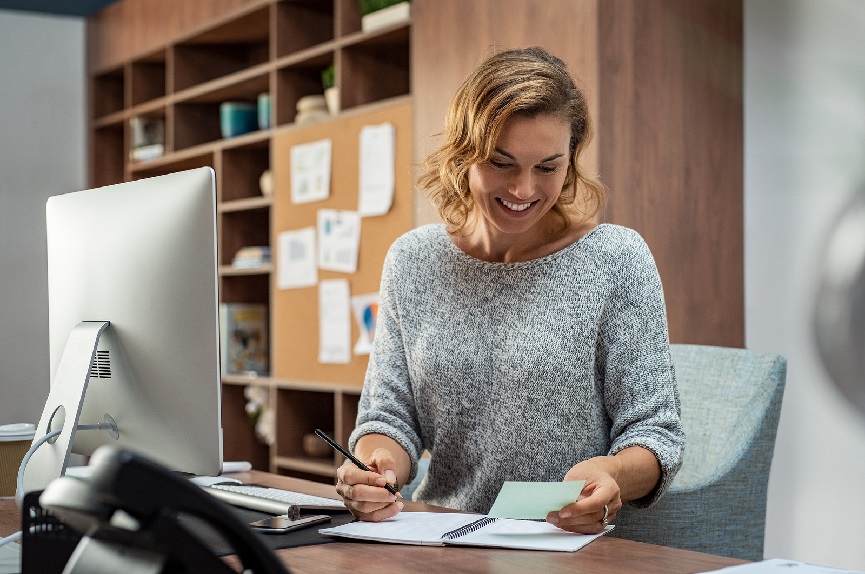 woman working on paper work