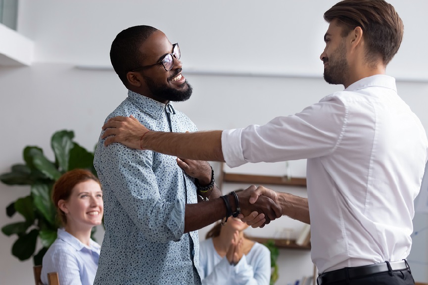 two men shaking hands