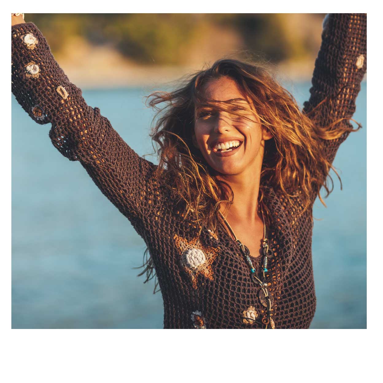 Happy woman walking with arms up