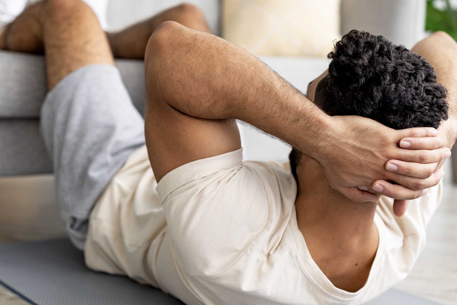 man doing sit-ups 