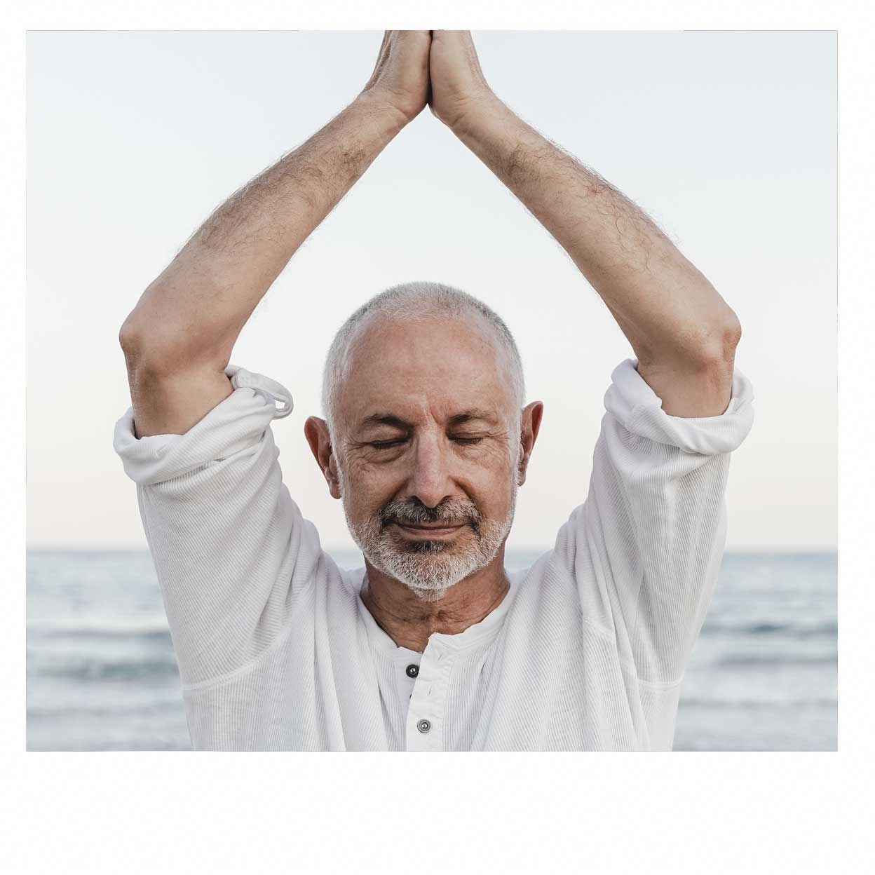 mature man meditating