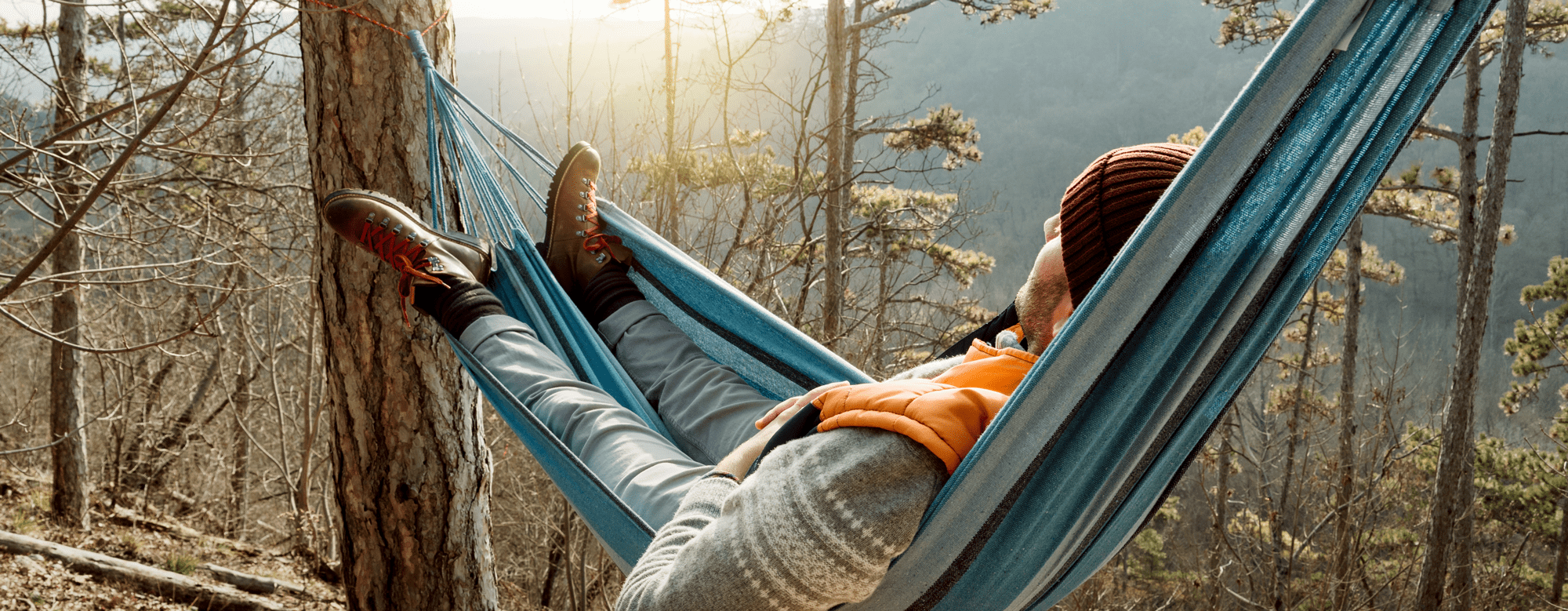 small-young-man-resting-in-hammock-outdoor-lifestyle-2022-12-17-04-11-59-utc
